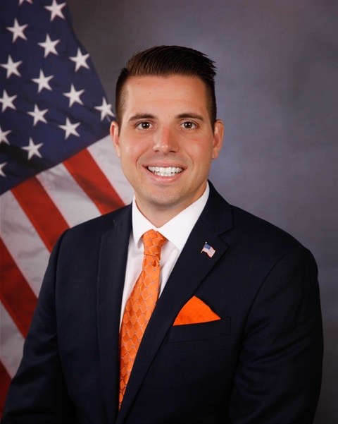 man with orange tie
